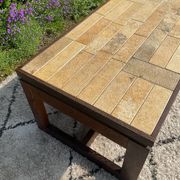 Vintage coffee table in rosewood and ceramic.