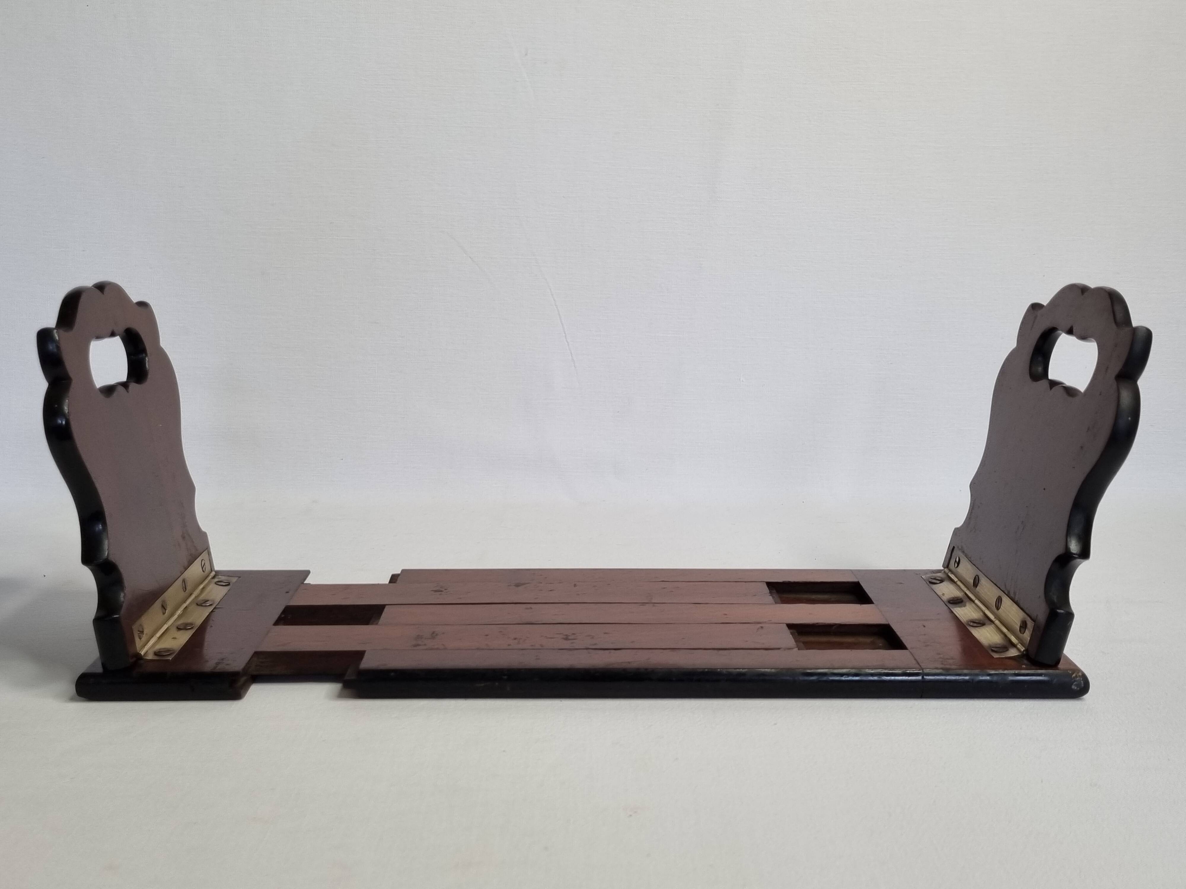 Solid wood zippered bookend, folding, 1900