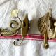 Pair of solid brass double patères