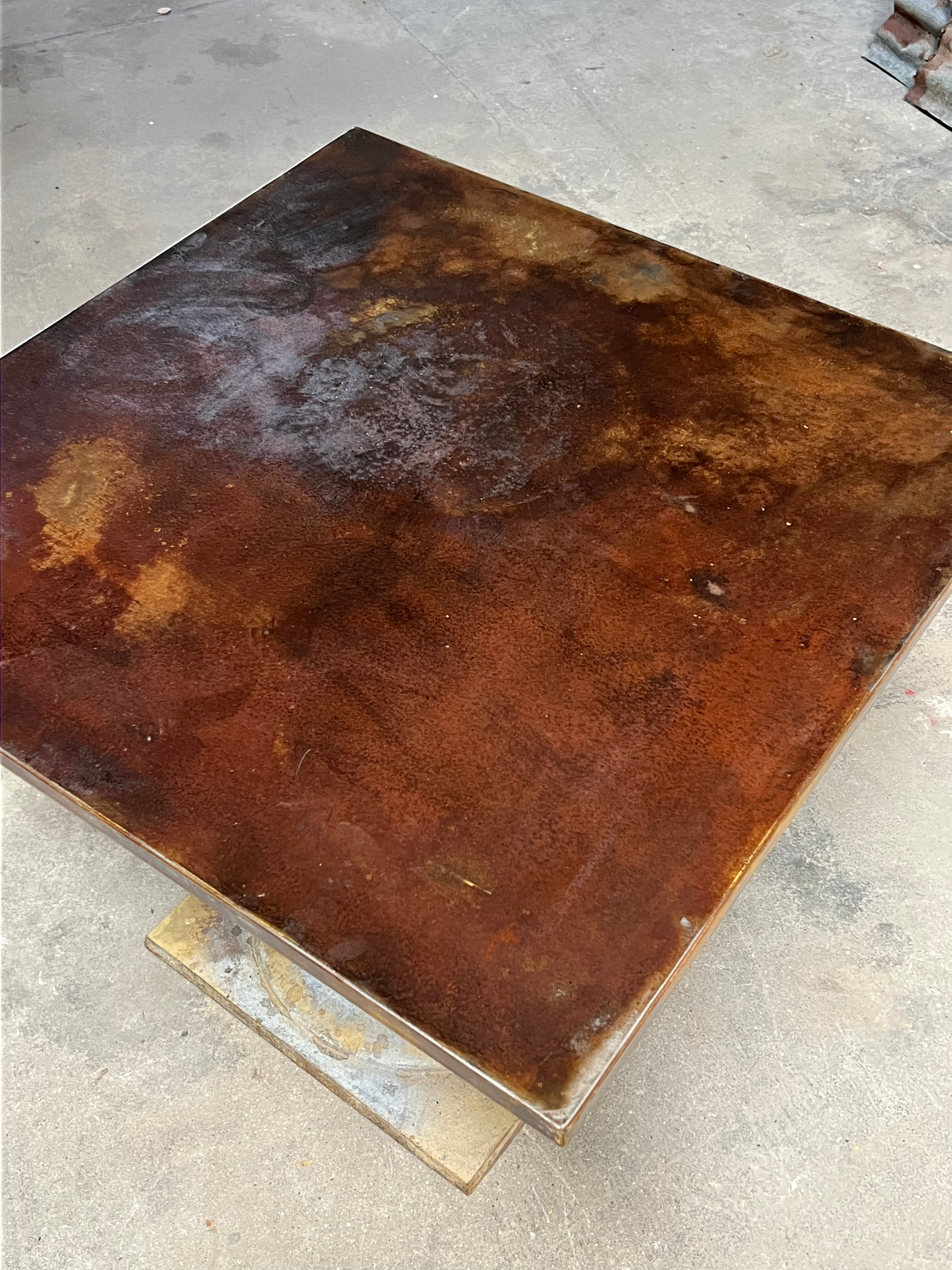Patinated steel and zinc table