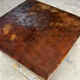Patinated steel and zinc table