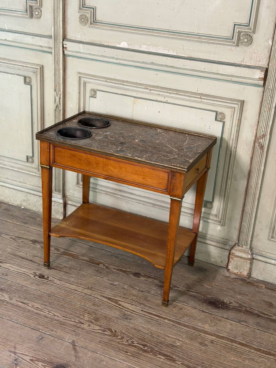 Louis XVI refreshment table in mahogany, brass and marble, 18th century.