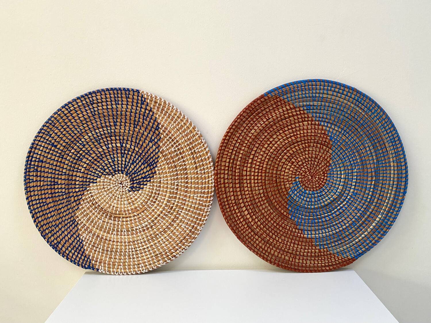 Duo of rattan trays for wall decoration