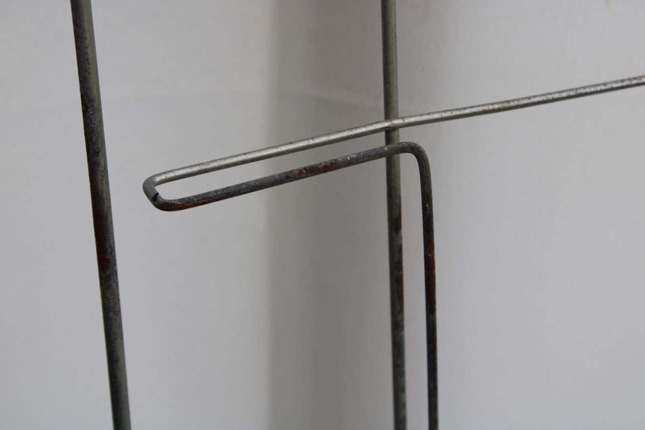 Former metal newspaper display