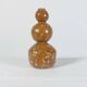 Unique vintage ceramic vase in the shape of a decorative sphere.