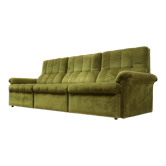 Vintage green velvet canapé made in the 1970s.