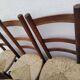 8 vintage straw chairs in the style of Charlotte Perriand.