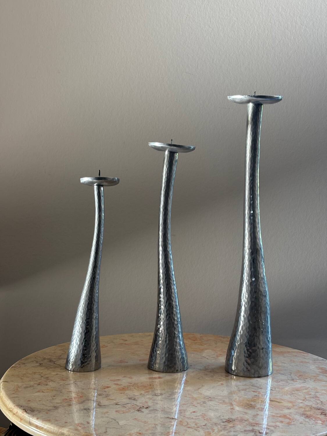 Cast aluminum candle holders