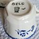 Antique cups with iron earthenware saucers