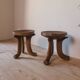 Pair of ancient Ethiopian tripod stools made of monoxyle wood.