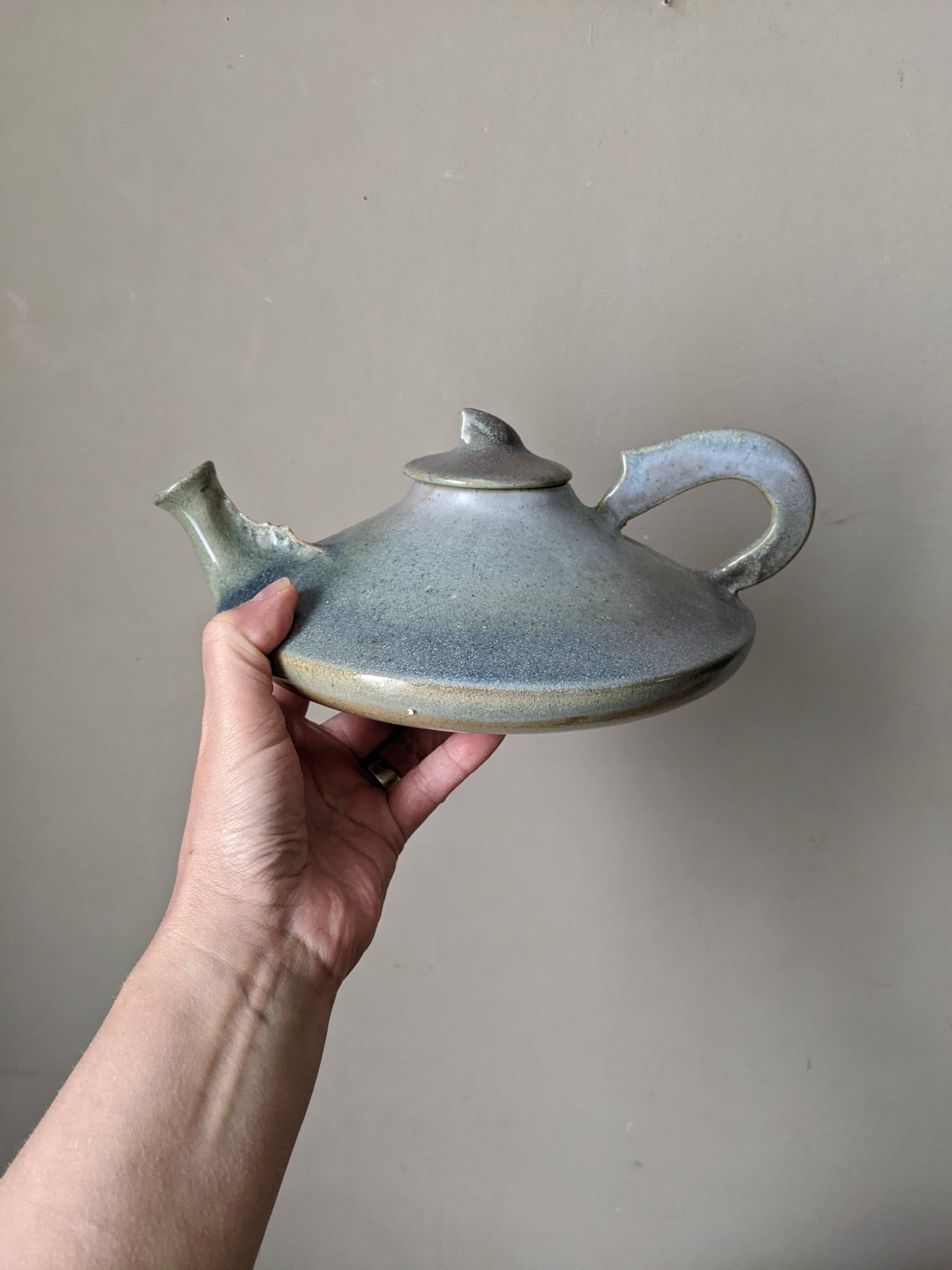 Ceramic teapot, artisanal, Japandi countryside decoration.