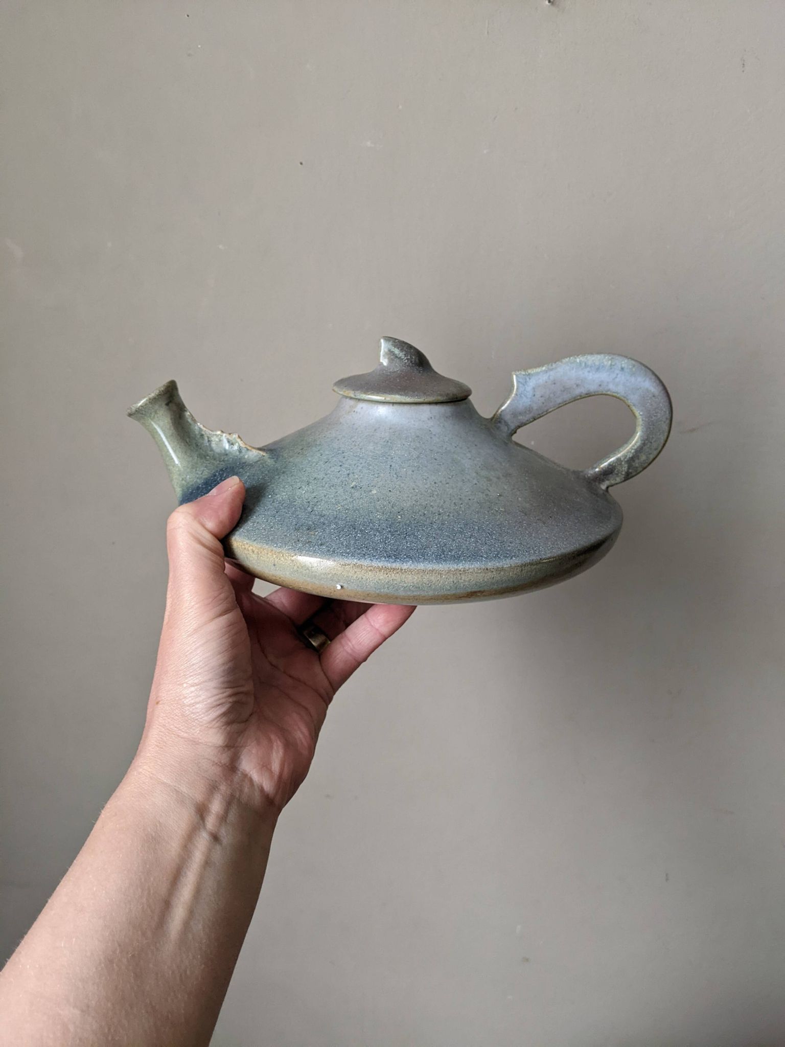 Ceramic teapot, artisanal, Japandi countryside decoration.