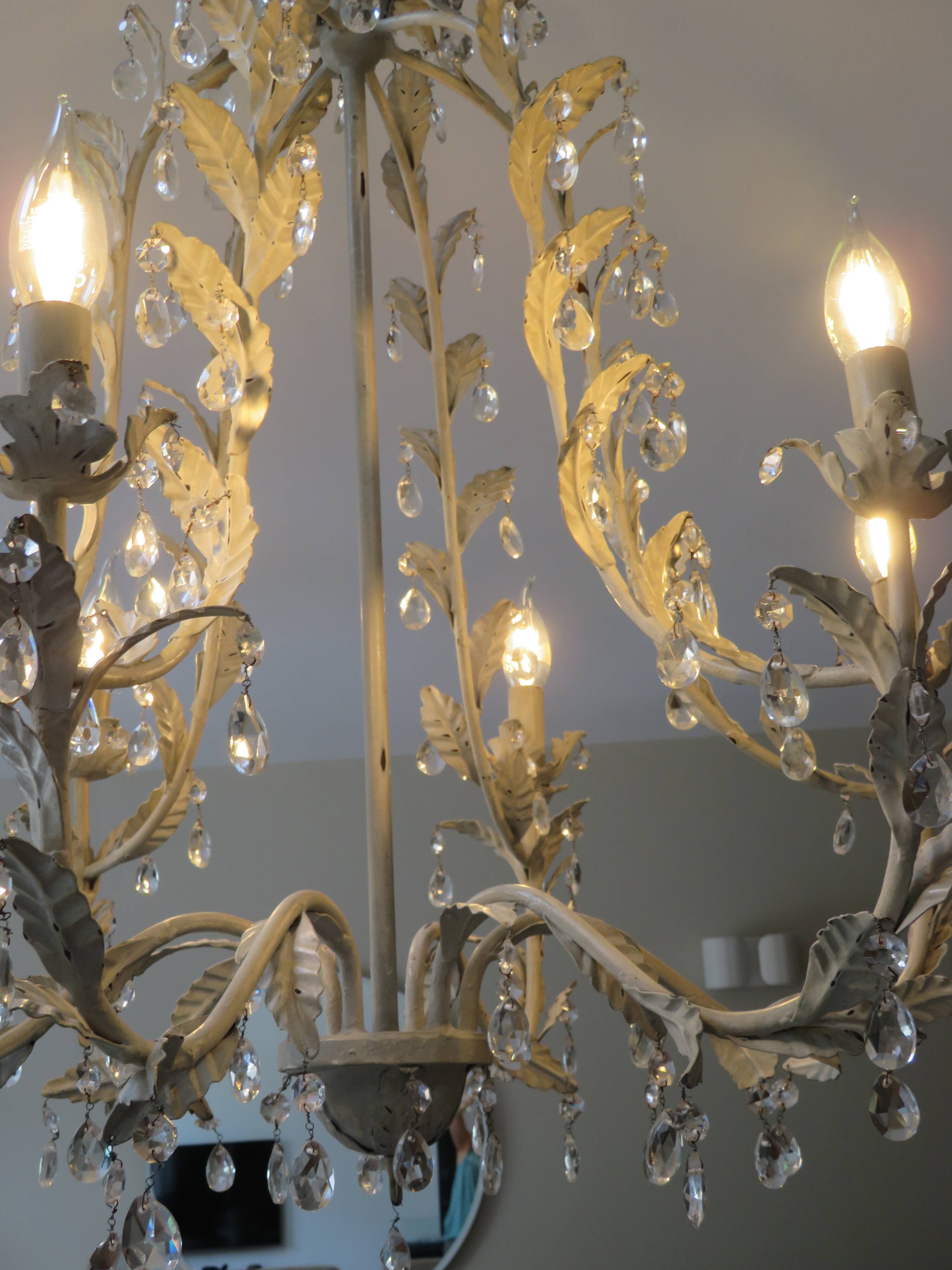 Large cage chandelier in aged metal.