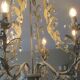 Large cage chandelier in aged metal.