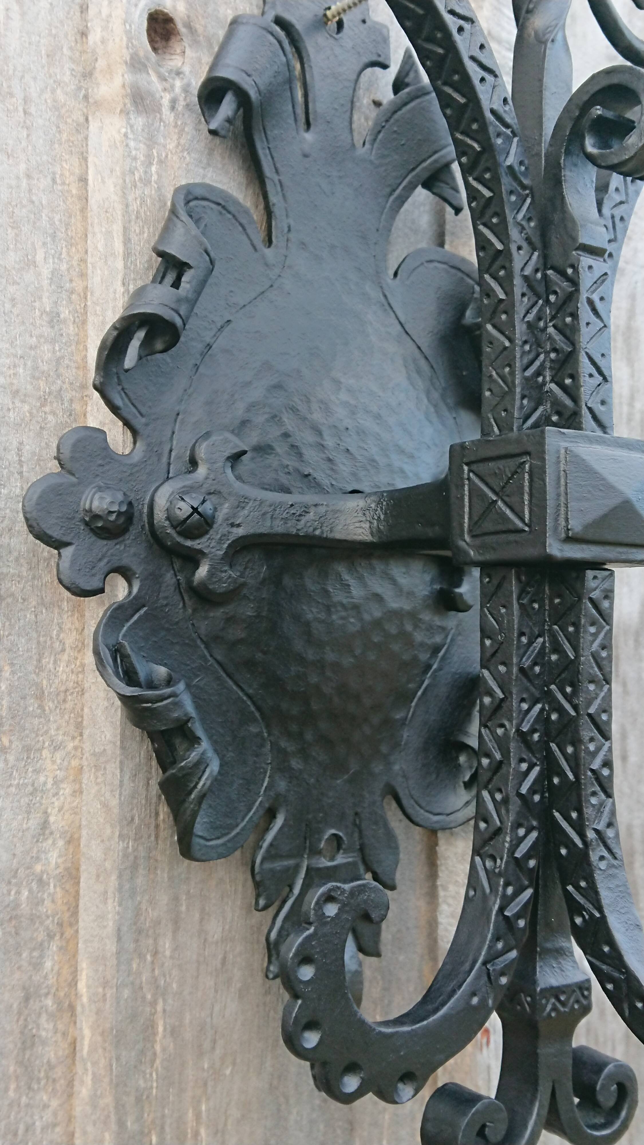 Pair of black wrought iron sconces - neo-Gothic style - from the 1950s