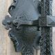 Pair of black wrought iron wall sconces - neo-Gothic style - from the 1950s