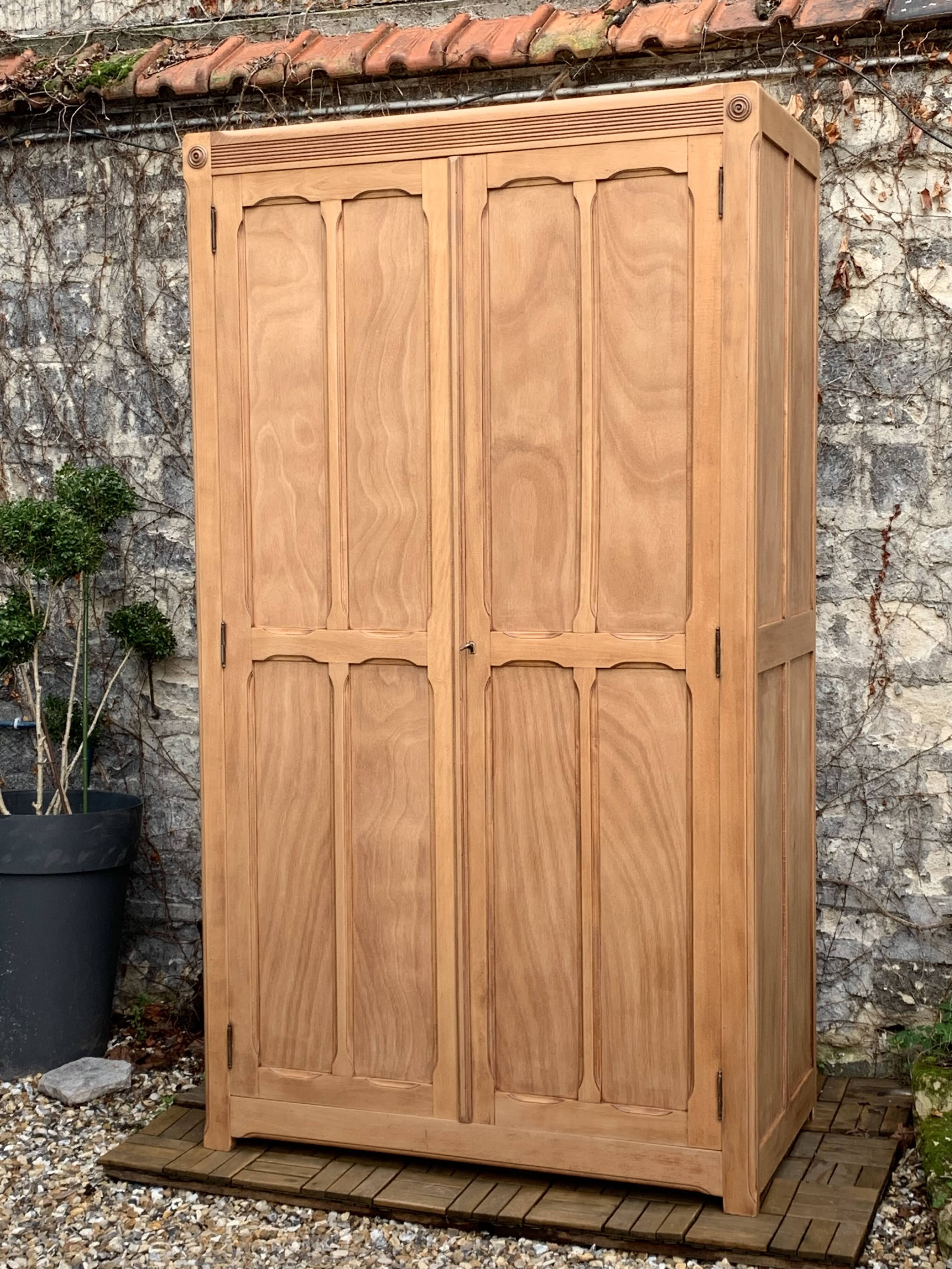 Parisian paneled cabinet in raw wood, 1940