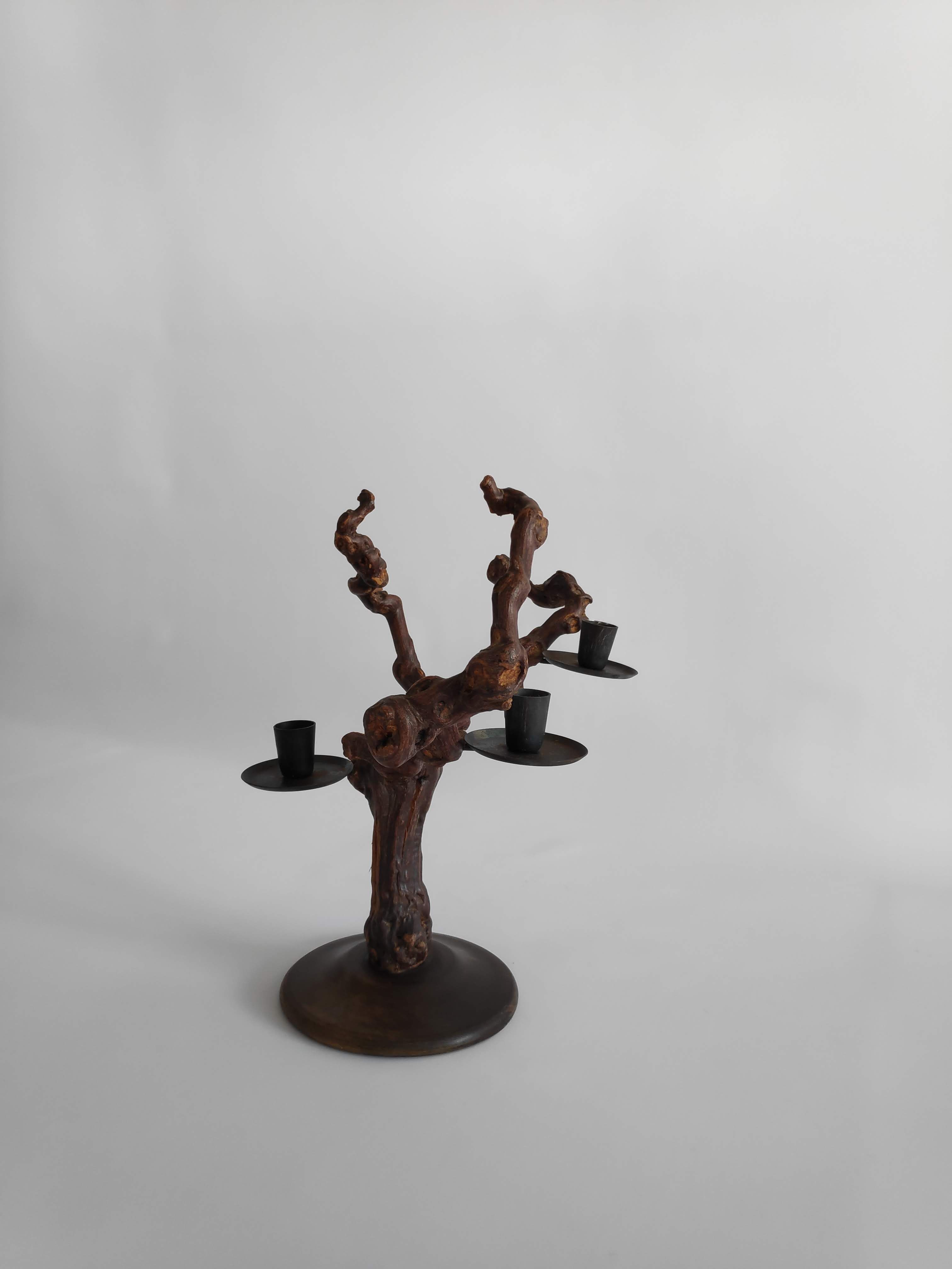 Vintage candlestick in vine shoots of the years 70
