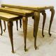 Set of three nesting tables in onyx and brass, 20th century.
