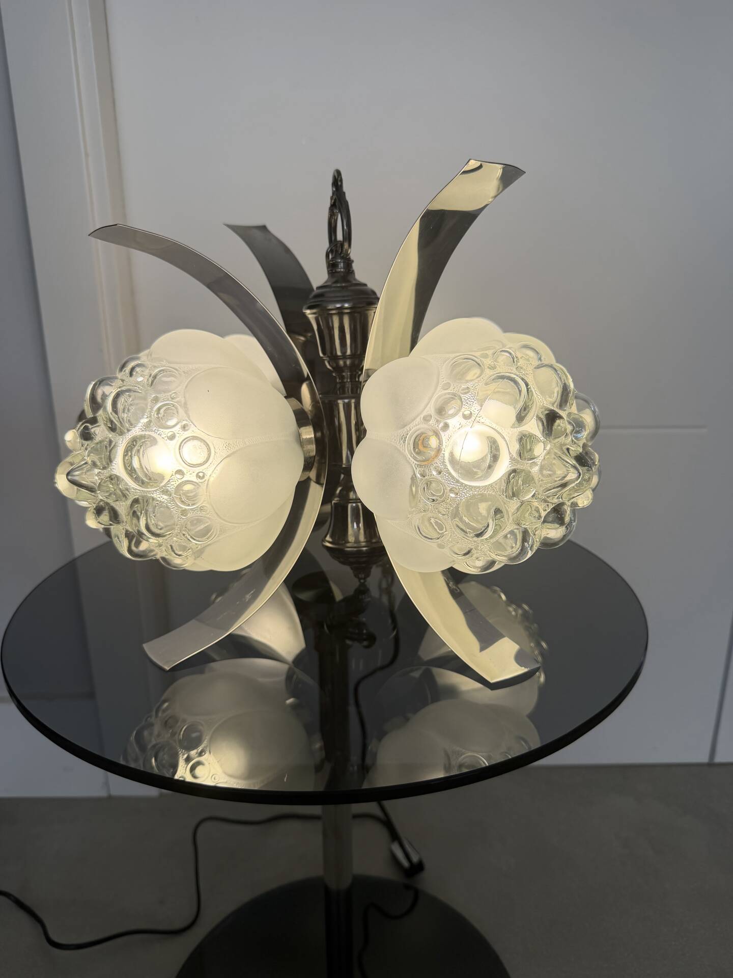 Vintage chandelier with 4 glass bubble globes and silvered metal.