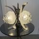 Vintage chandelier with 4 glass bubble globes and silvered metal.