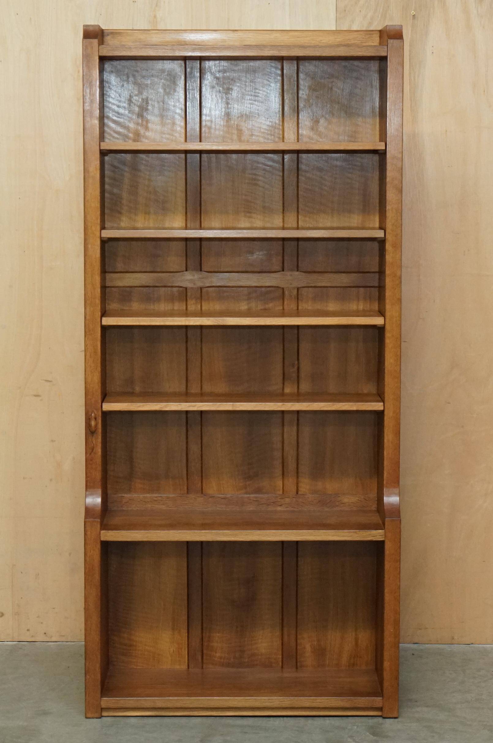 Pair of Robert Mouseman Thompson oak carved bookshelves.