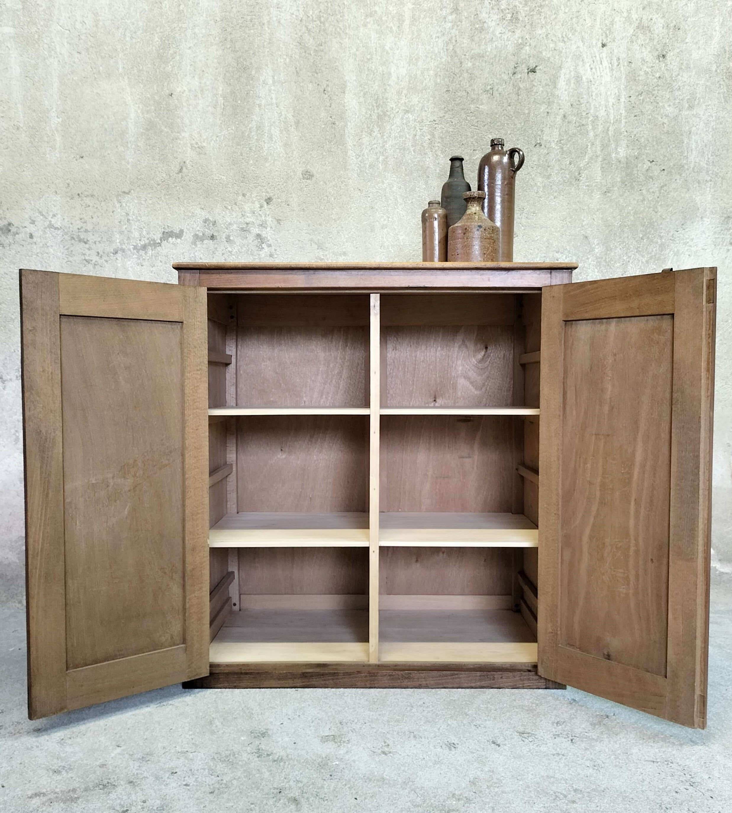 Small wooden sideboard with two doors.
