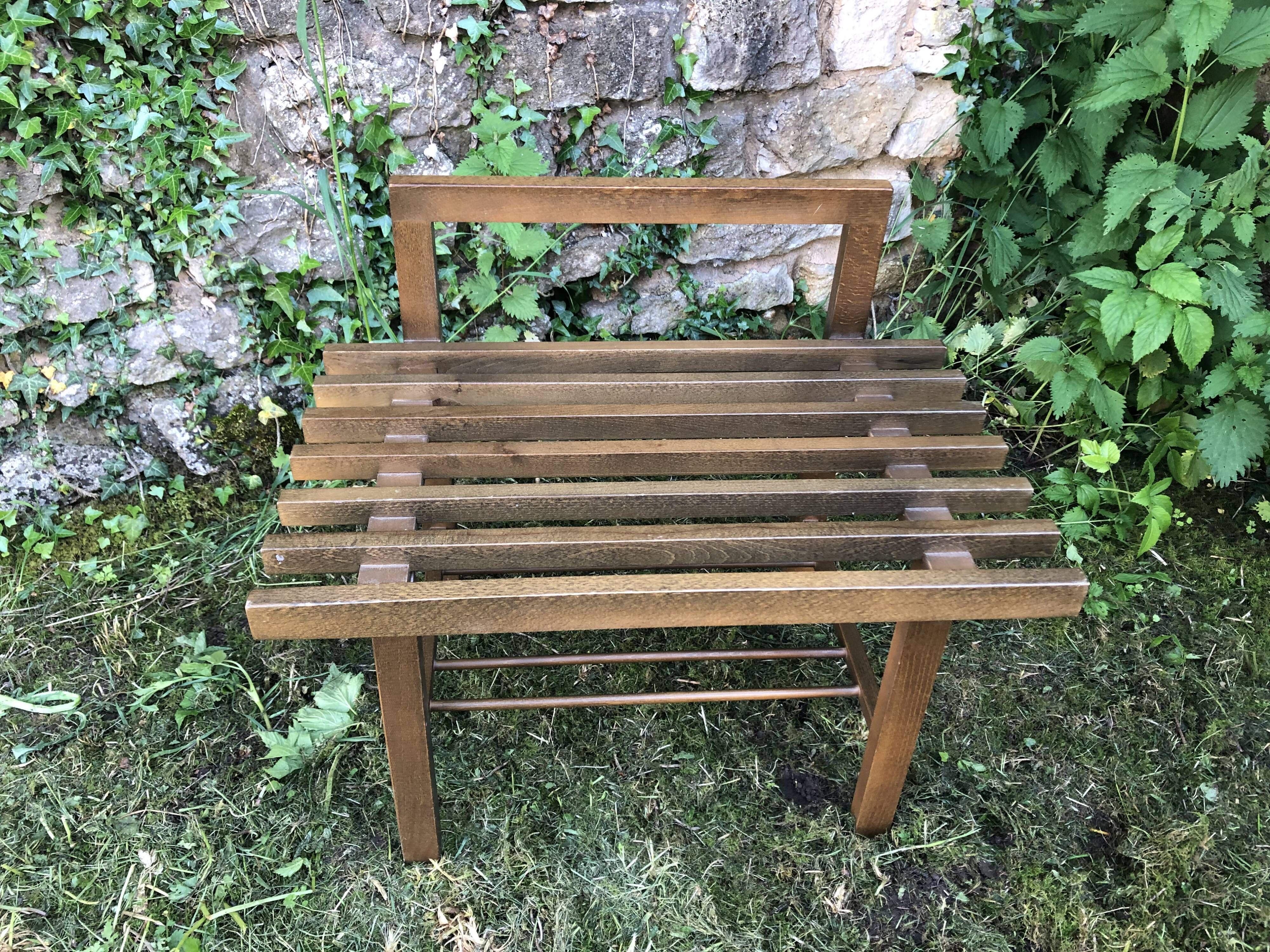 Wooden luggage rack or small bench or piece of vintage sofa 70s