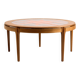 Coffee table in walnut with a ceramic top.
