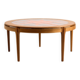 Coffee table in walnut with a ceramic top.