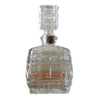 Glass carafe in the shape of a perfume bottle