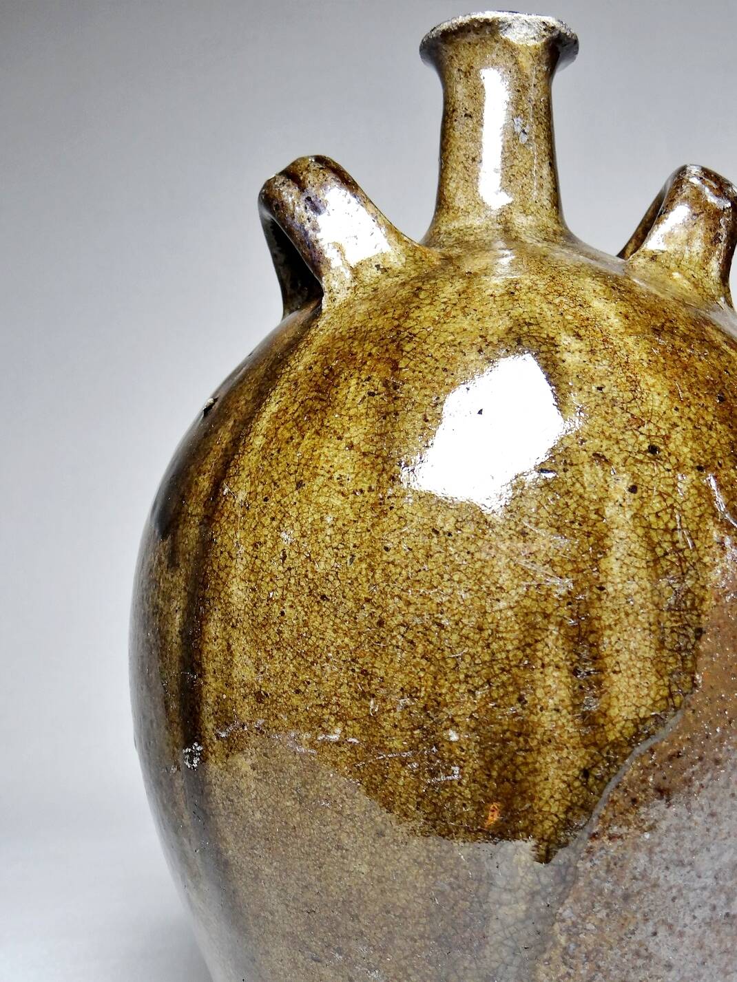 Old stoneware oil jar, glazed and enamelled, 2 handles