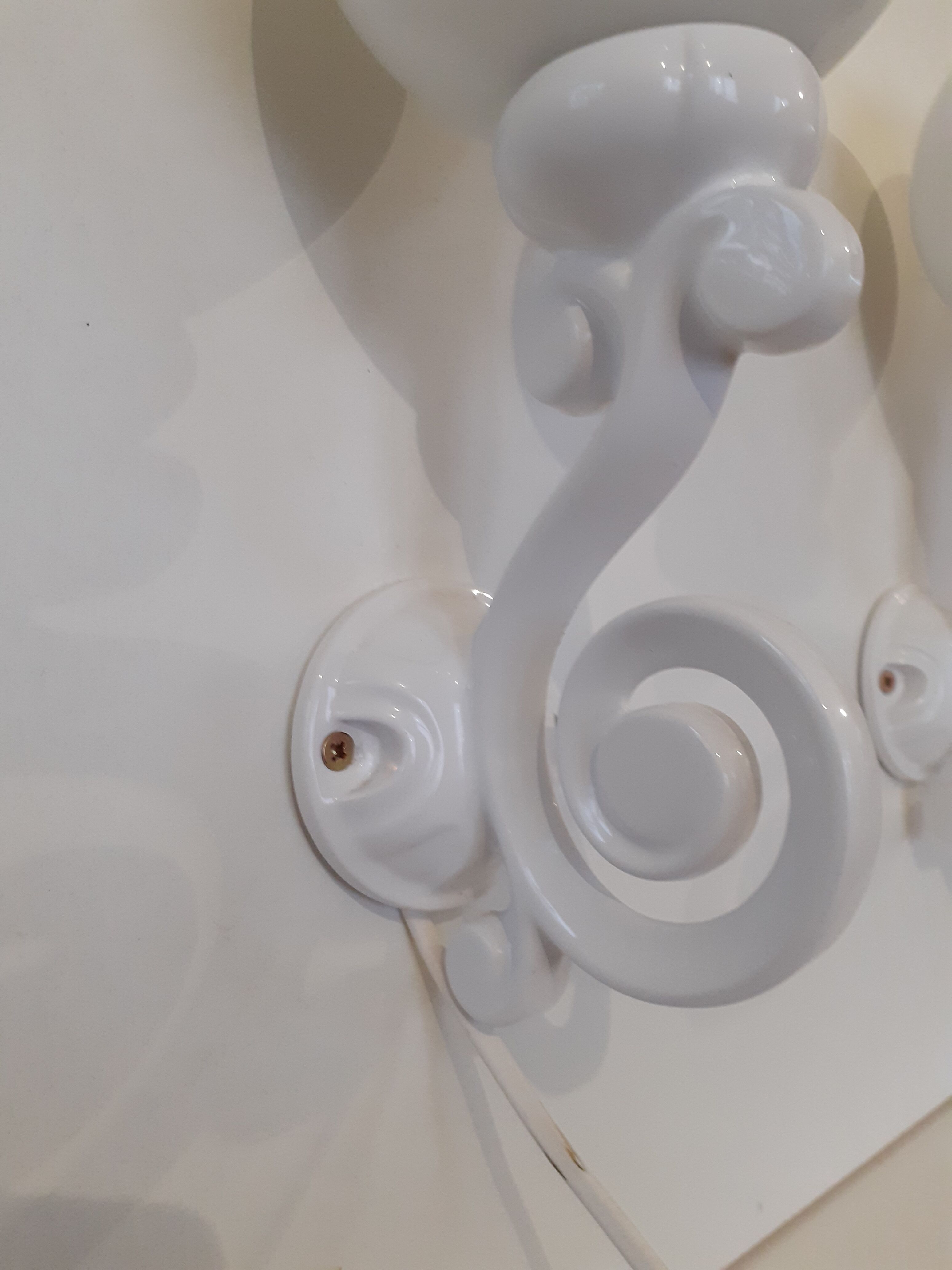 Pair of cast iron sconces