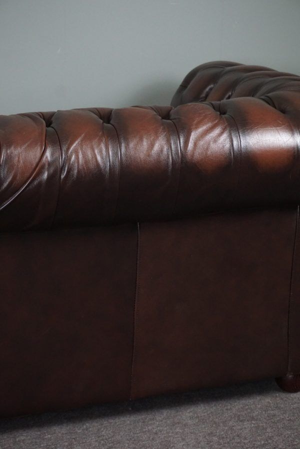 Chesterfield sofa in cowhide, 4 seats