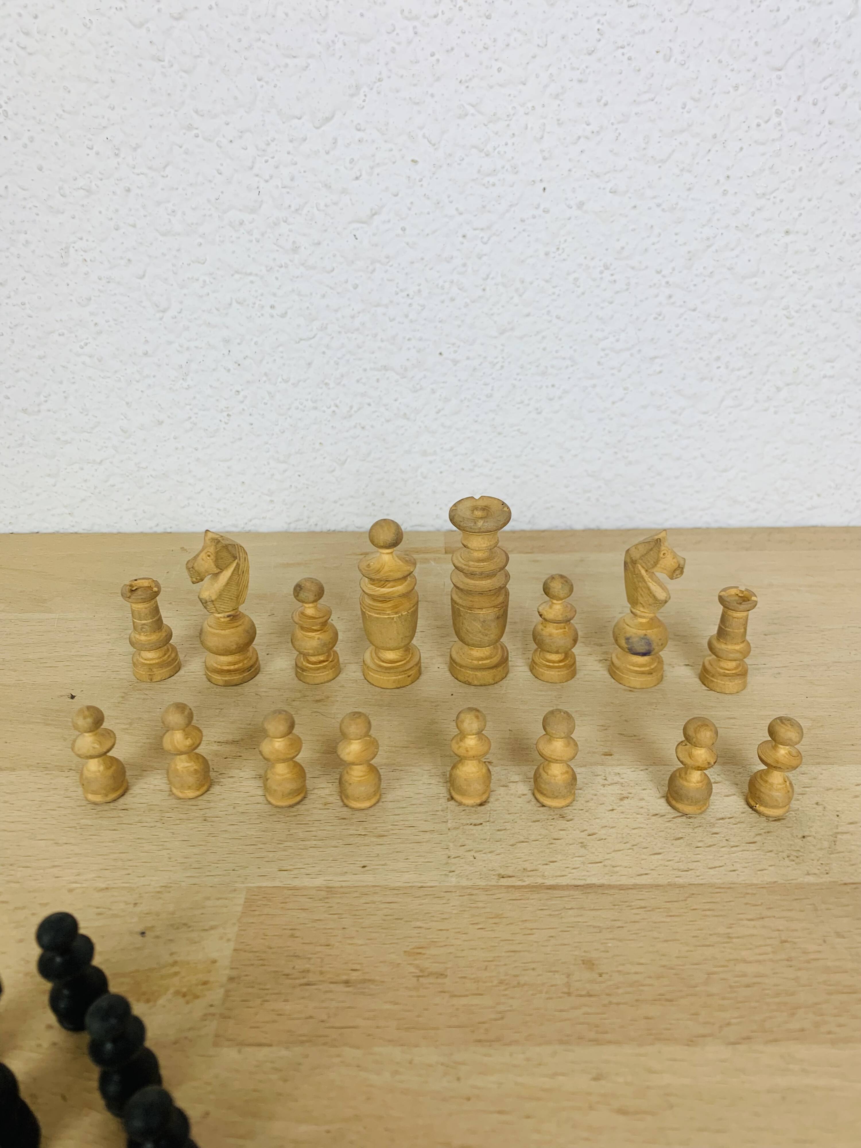 Antique turned wooden chess pieces