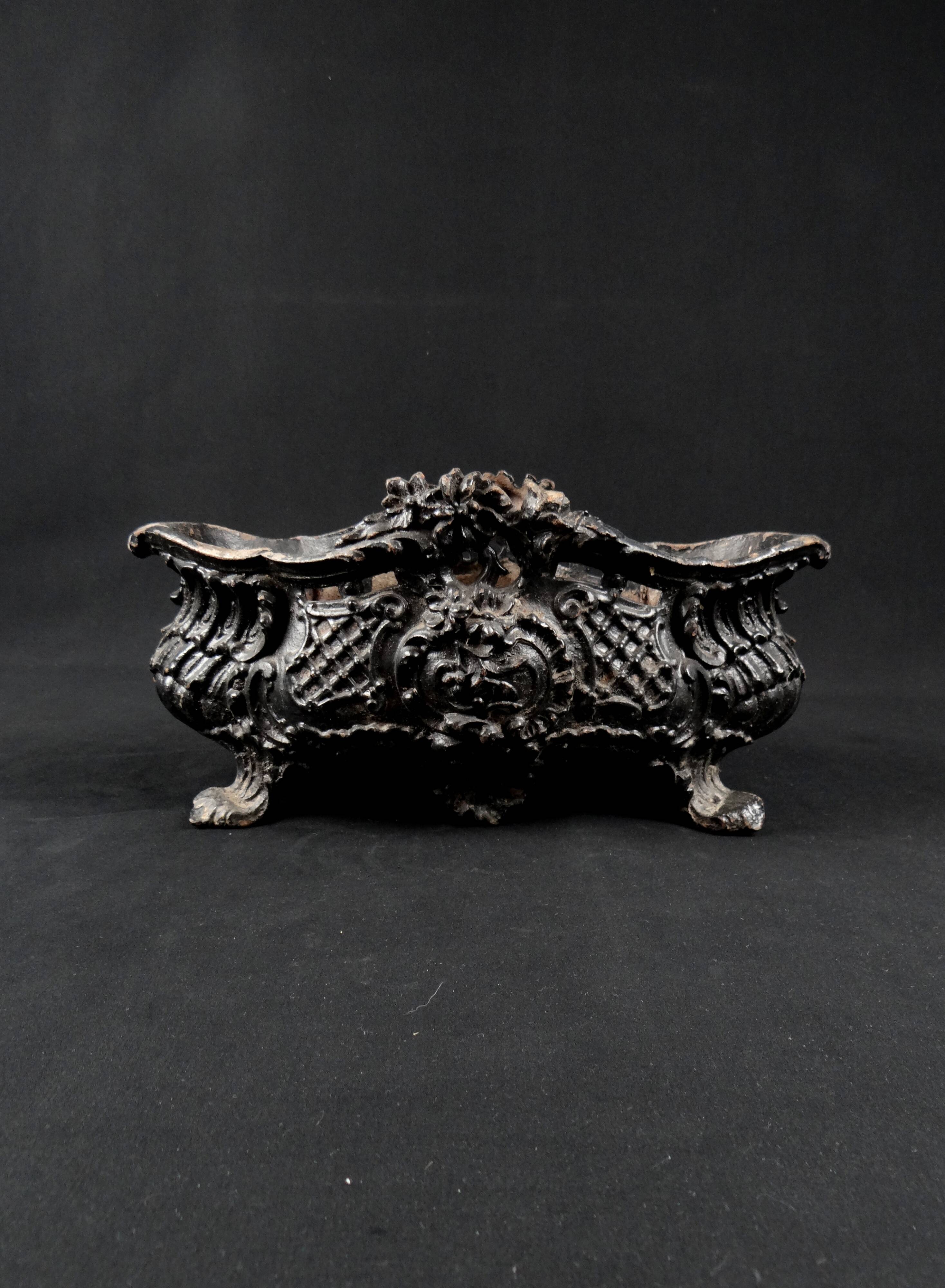 Antique black cast iron planter from the late 19th century Rocaille style