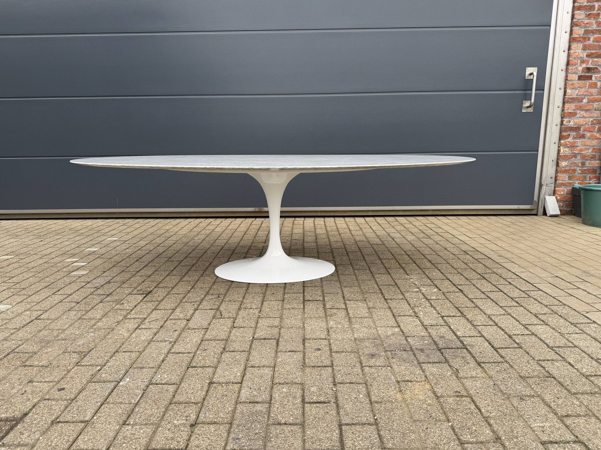 Original Knoll Tulip oval dining table (244cm) in Carrara marble.