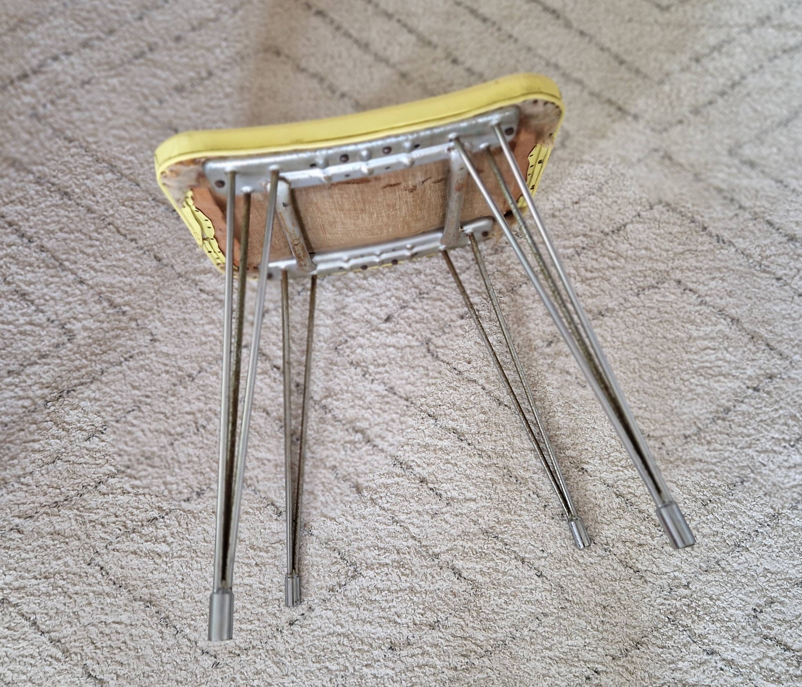 Vintage yellow leatherette stool from the 1950s