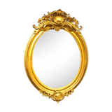 Golden oval mirror