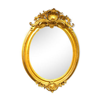 Miroir doré ovale