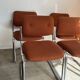 Vintage 70s orange tubular chairs