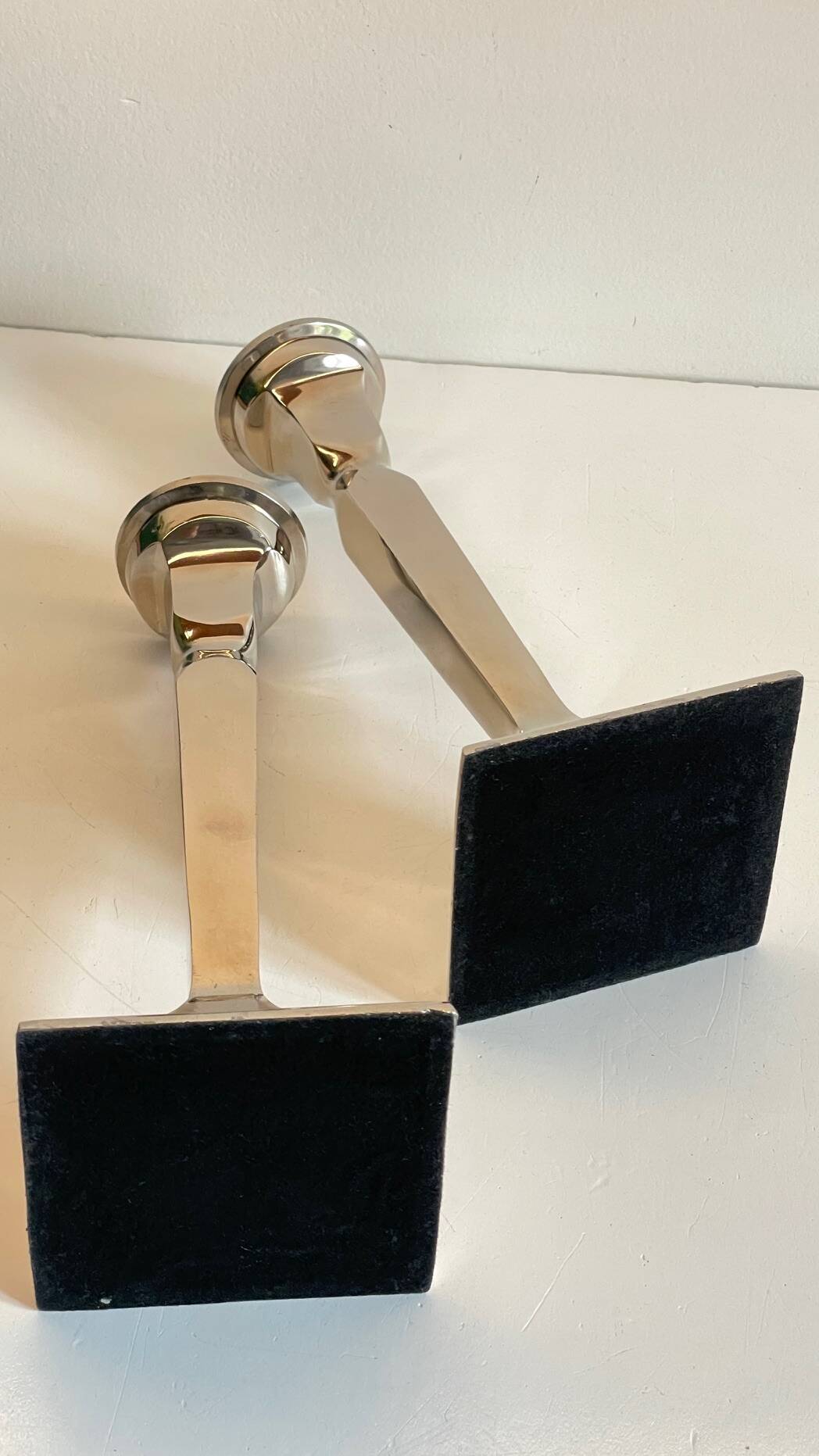 Pair of vintage cast aluminum candlesticks