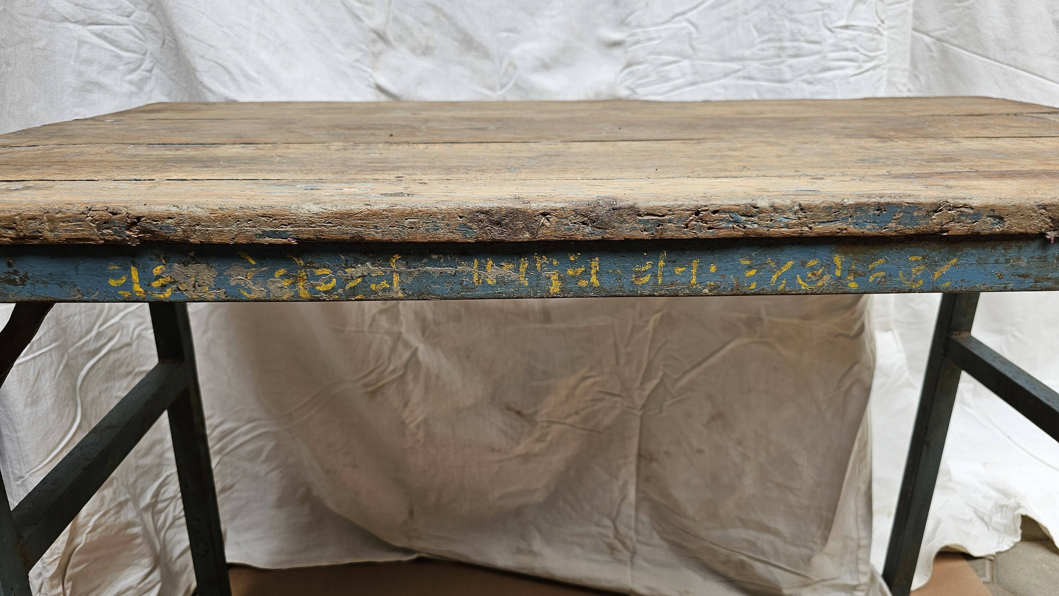 Folding workshop table in teak and wrought iron