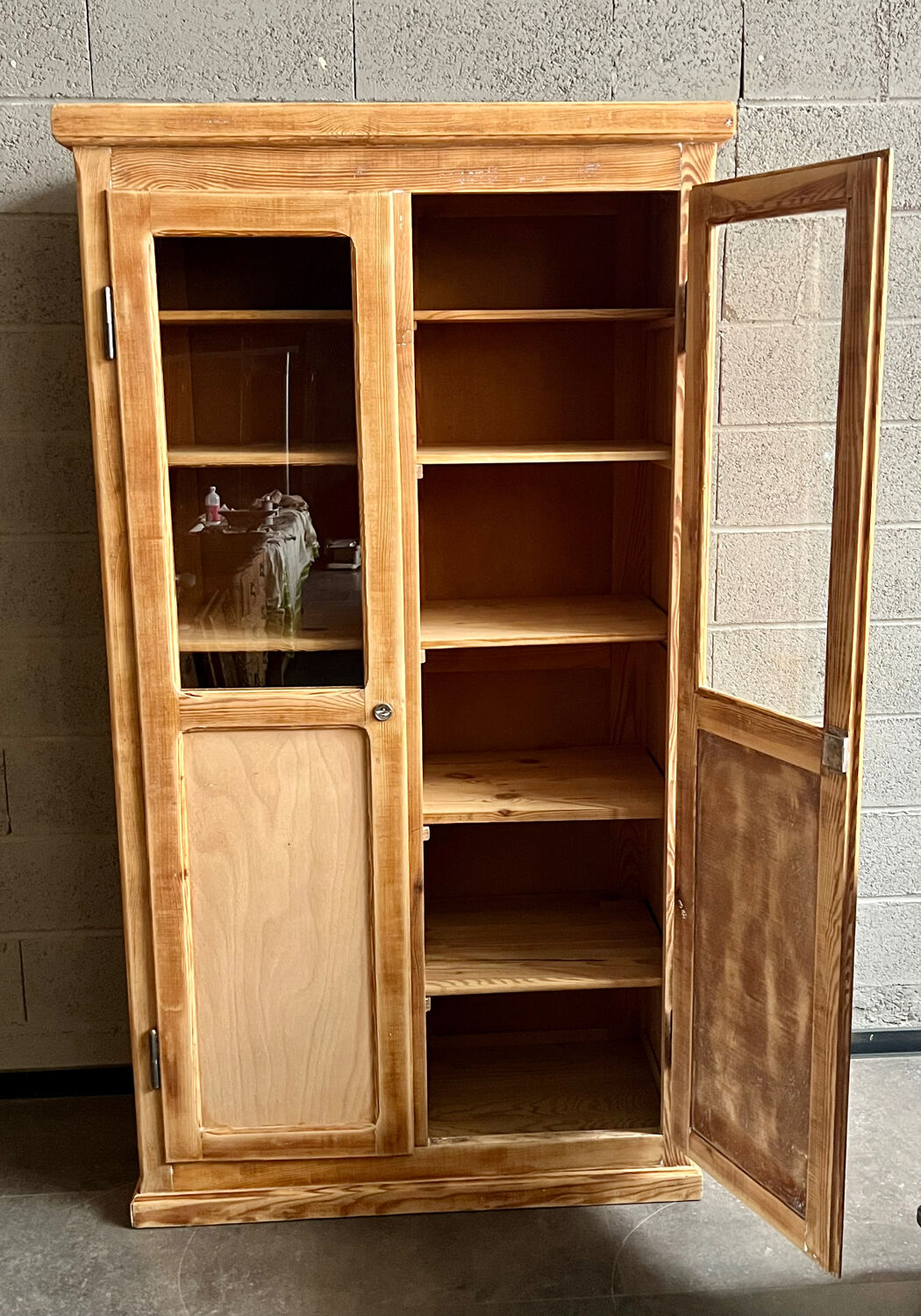 Antique pharmacy display case