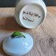 Porcelain jam pot with hand-painted plum design, signed sweet jar.