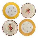Flowered stamped dessert plates and matching ones.