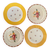 Assiettes dessert fleuries estampillées et assorties.