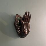 Hand-shaped coat hook