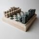 Vintage marble chess set from the 1970s, green and beige stone board, heavy design, geometric pieces, sculptural tabletop game, gift idea.