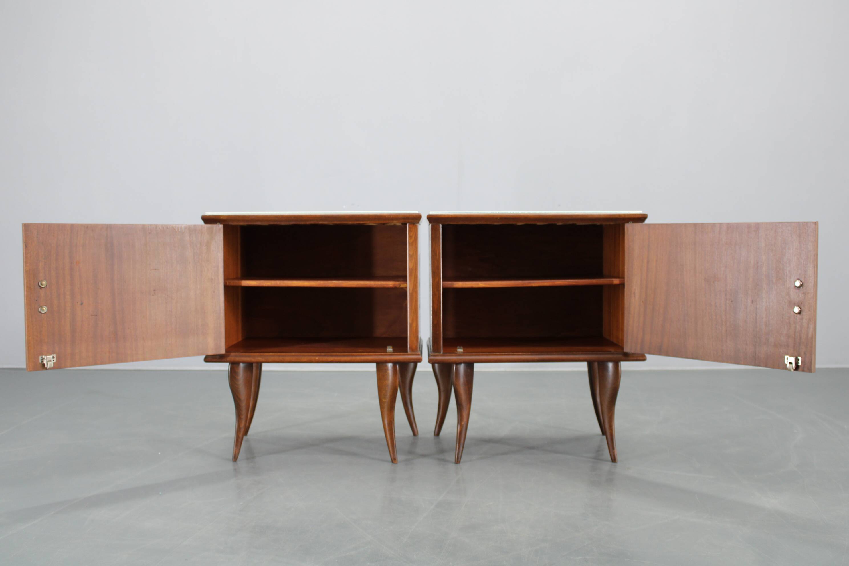 Pair of mid-century Italian walnut nightstands with glass top, 1950s